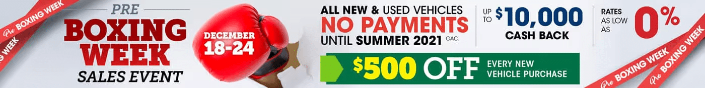 Pre-Boxing Week car sales event offering up to $10,000 cash back, $500 off, and no payments until summer.