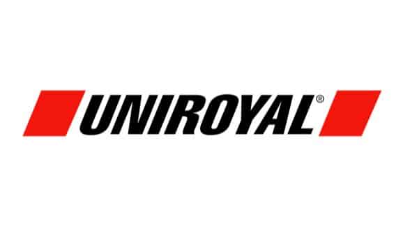 Dunlop Tires logo featuring bold black lettering and red triangular emblem.