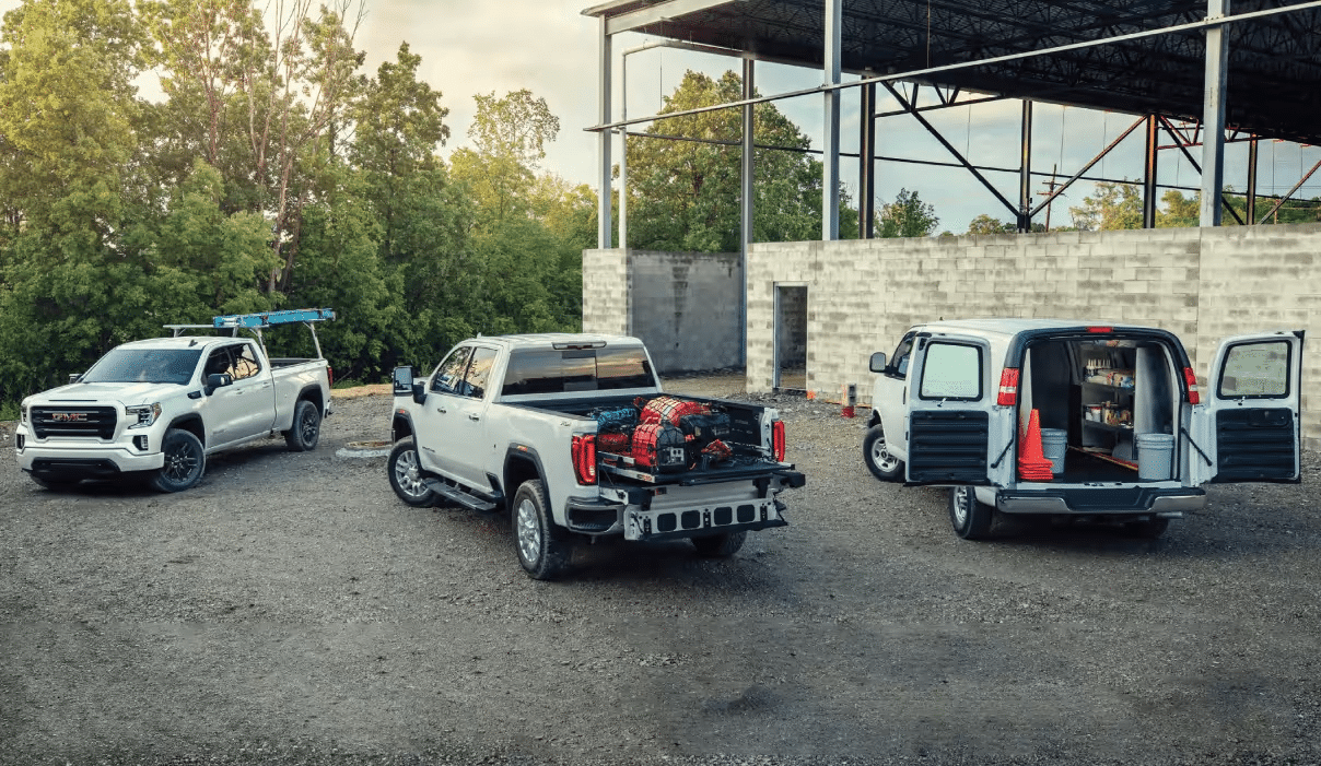 Lineup of all GMC commercial and fleet vehicles in a parking lot
