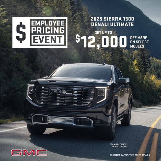 Demo clearance car sale with up to $12,375 off, featuring various GMC vehicles under a blue sky.