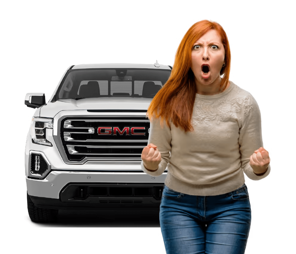 Woman standing in front of a GMC truck