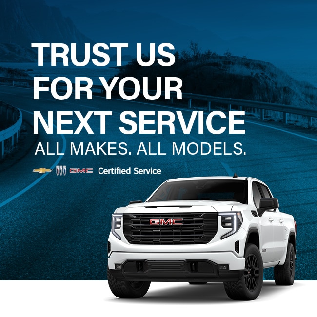 White GMC truck on road. Text: "Trust us for your next service. All makes. All models." GMC Certified Service.